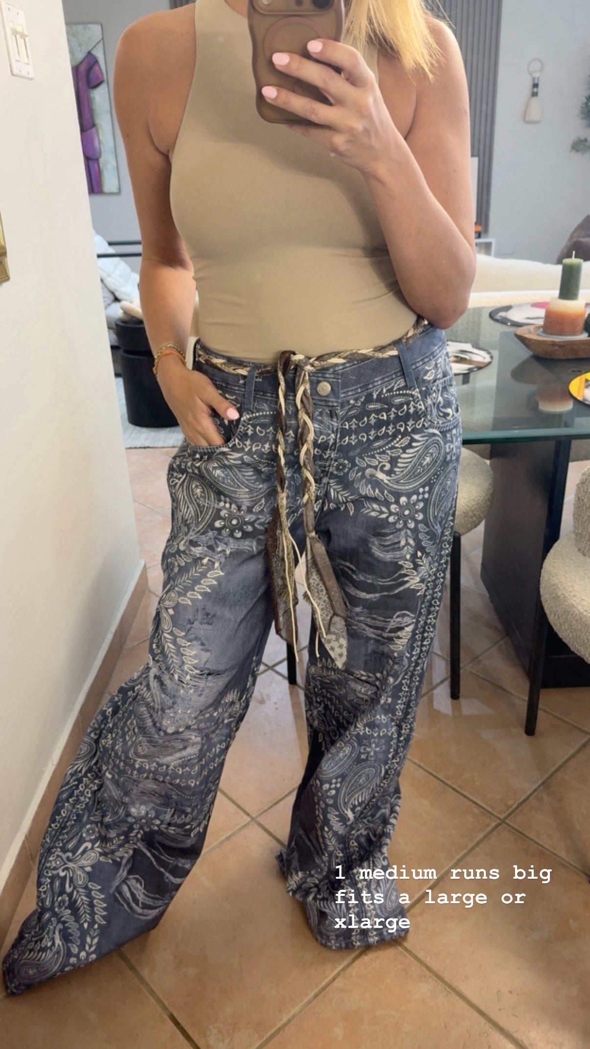 Paisley Denim runs big can fit a large or xlarge